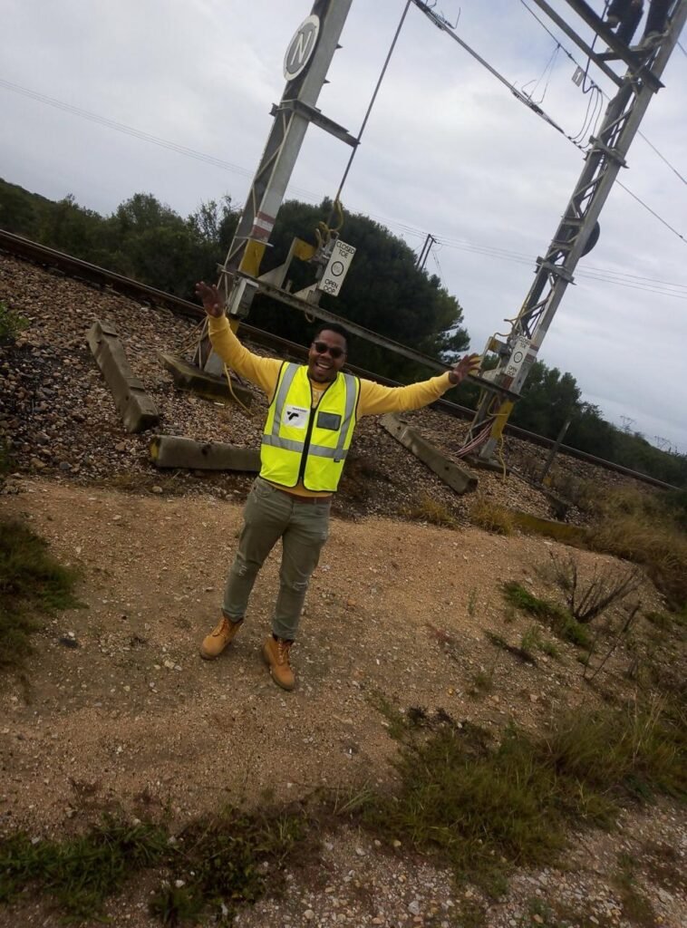 A person standing with arms up